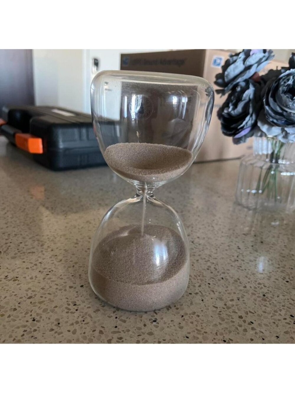 Glass hourglass with brown sand #timepiece #decorative